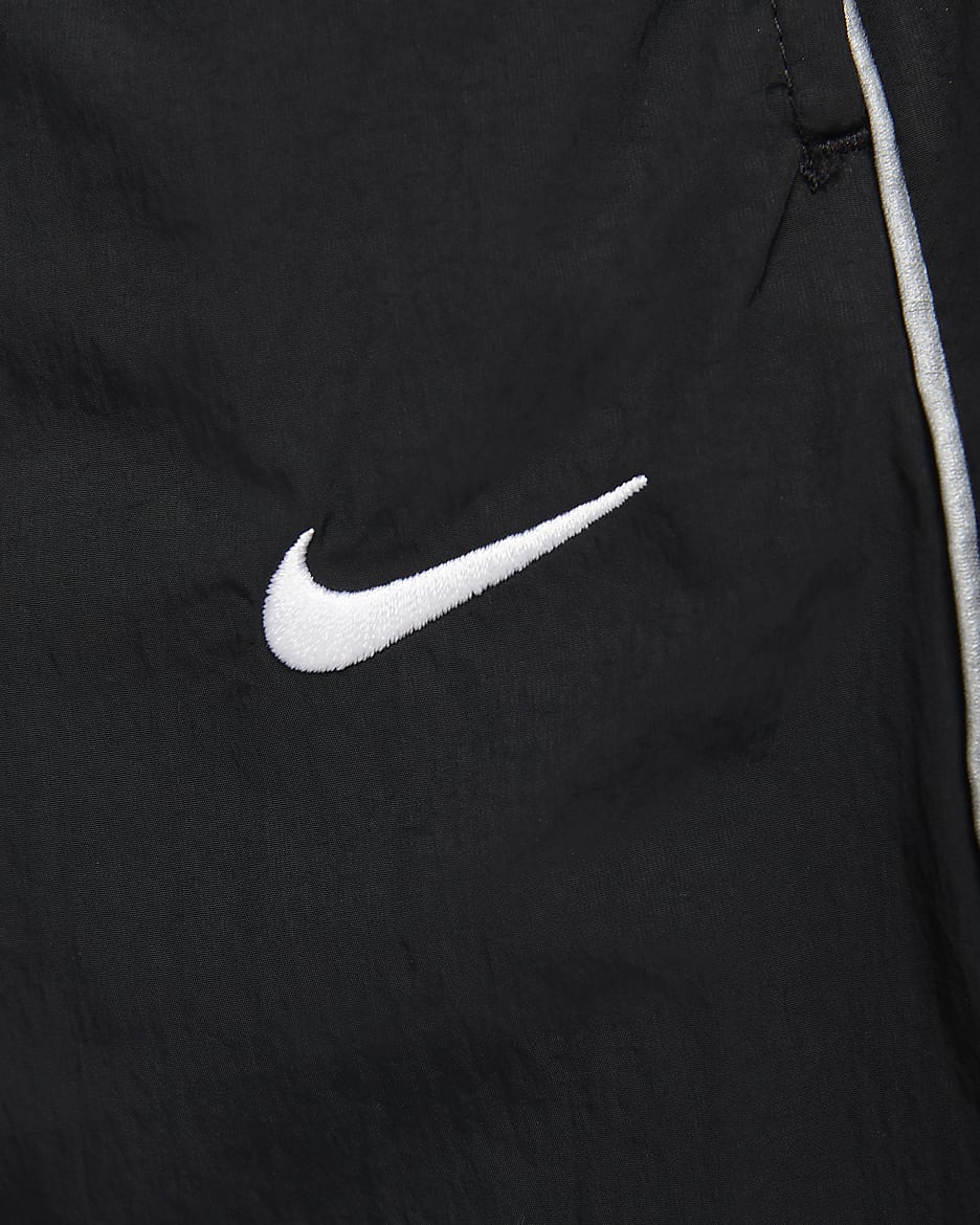 Nike factory Track Pants Jet Black Polyester White Swoosh Dri Fit has Ankle Zippers